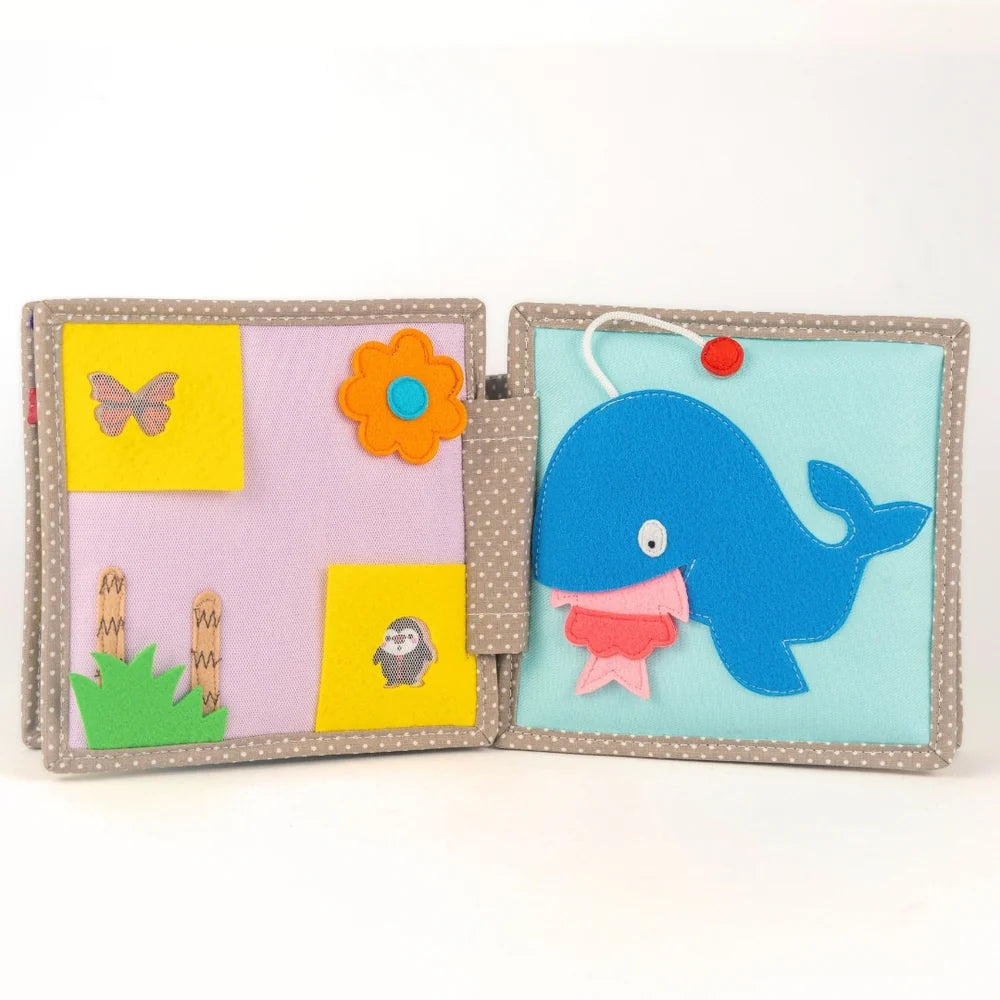 Jolly Designs Quiet Book Dösender Löwe – Fühlbuch erste Wörter ab 6 Monaten (ohne lose Teile)
