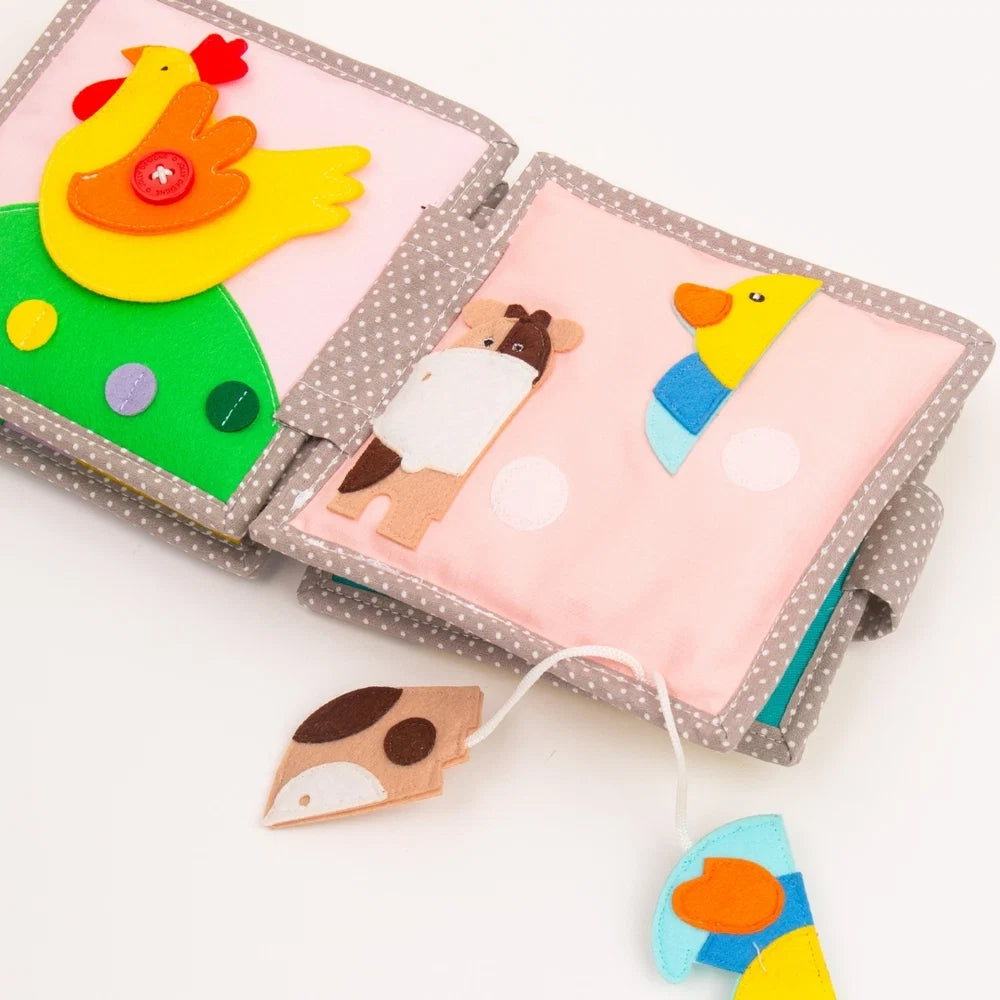 Jolly Designs Quiet Book Dösender Löwe – Fühlbuch erste Wörter ab 6 Monaten (ohne lose Teile)