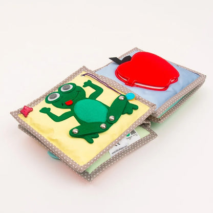 Jolly Designs Quiet Book Dösender Löwe – Fühlbuch erste Wörter ab 6 Monaten (ohne lose Teile)
